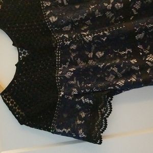Cocktail Dress:navy and black lace and dot pattern overlayed nude lining